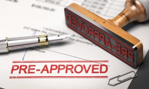 A homebuyer figures out how to get pre-approved for a house and secures their mortgage